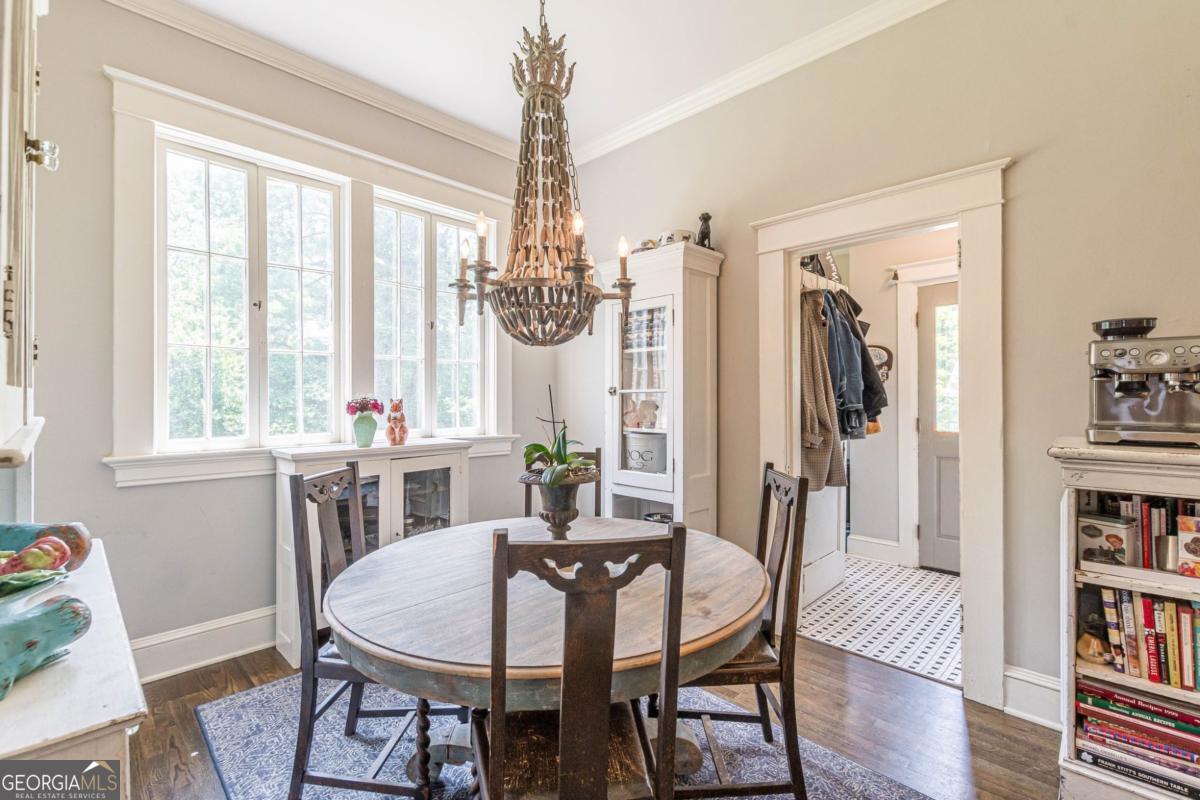 1878 Cambridge Avenue Atlanta, GA 30337 - Photo 27 of 84 a view of a dining room with furniture window and wooden floor