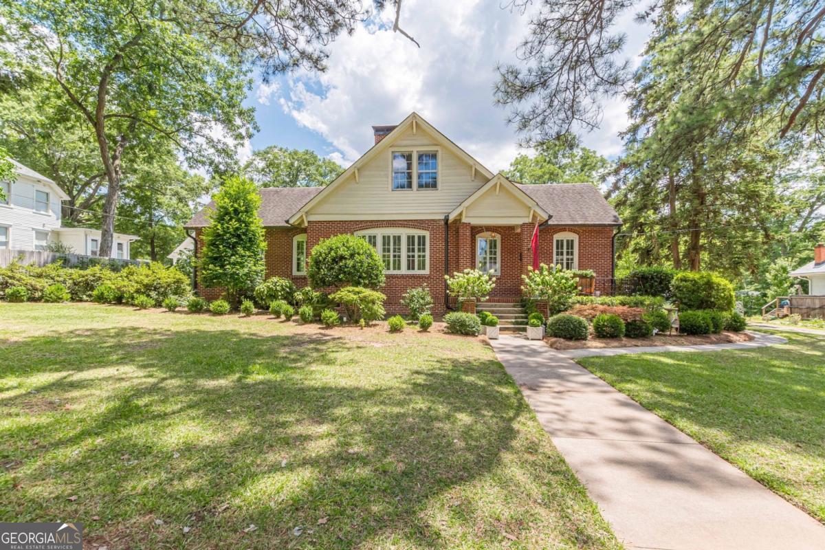 1878 Cambridge Avenue Atlanta, GA 30337 - Photo 5 of 84 a front view of house with yard and green space