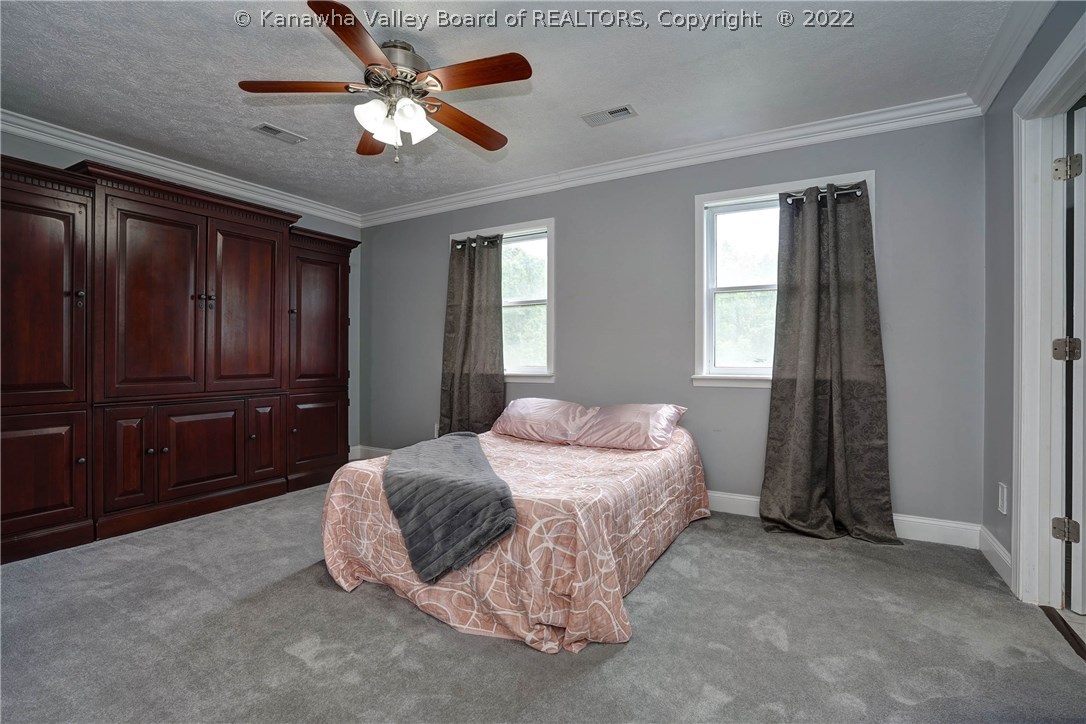 32 Thoroughbred Road Scott Depot, WV 25560 - Photo 15 of 30 Master bedroom with en suite.
