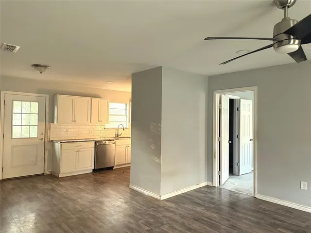 a view of an empty room and window