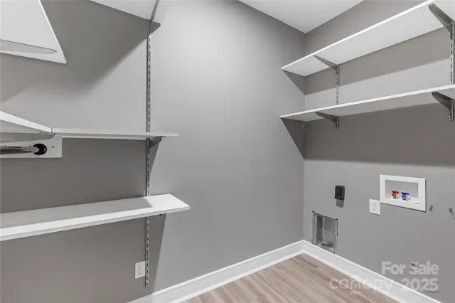 a view of storage and utility room