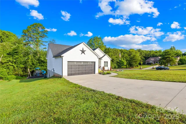 a view of a balcony with wooden floor