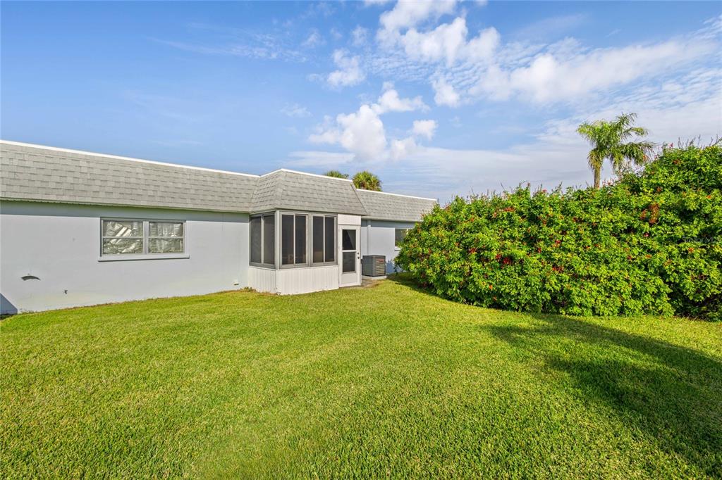 3801 42nd Street West Bradenton, FL 34205 - Photo 4 of 34 a view of a house with a garden