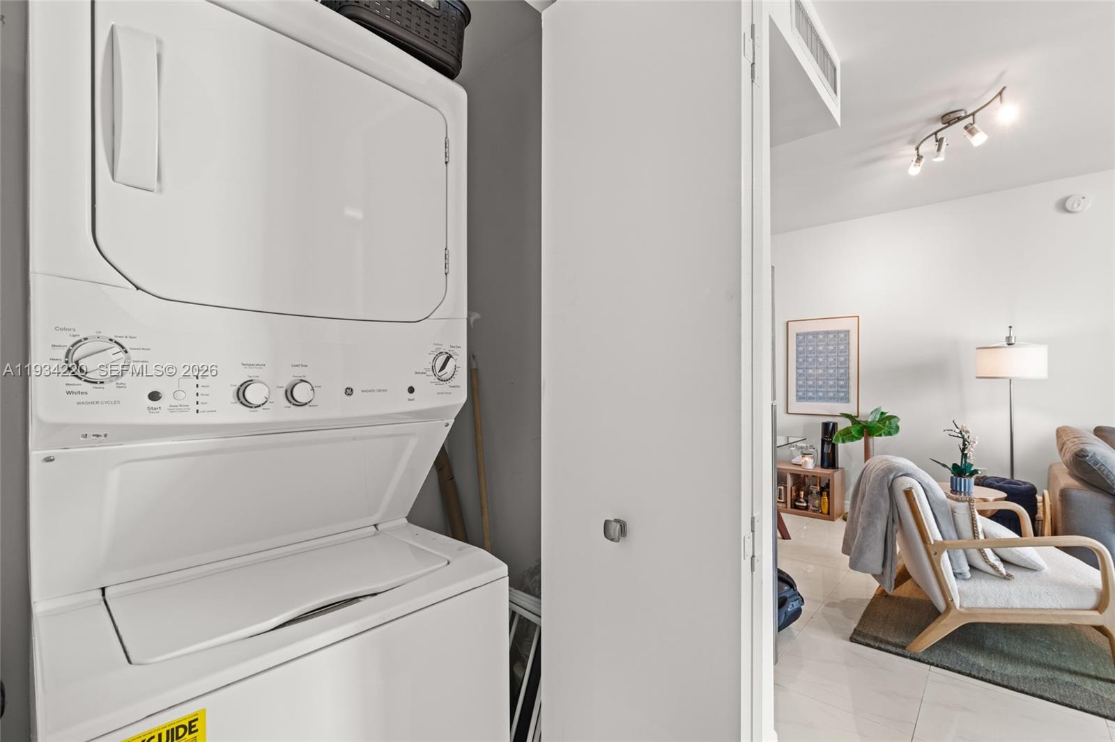 90 Southwest 3rd Street, Unit 2109 Miami, FL 33130 - Photo 21 of 31 view of utility room with washer and dryer