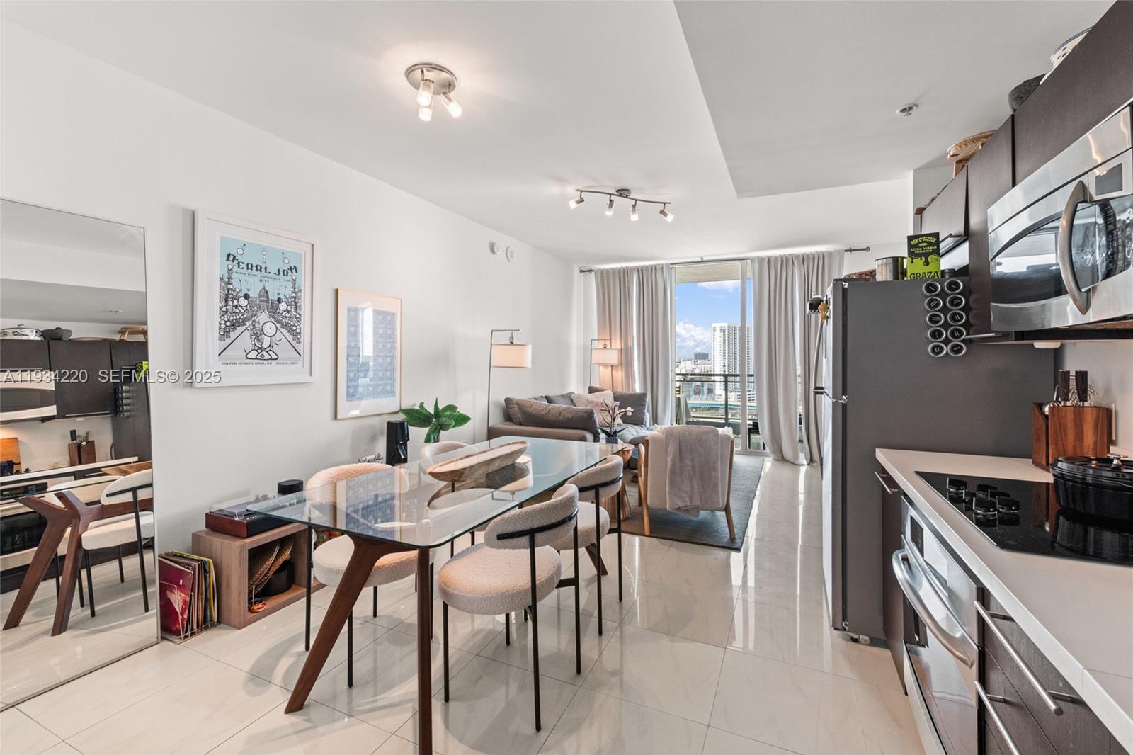 90 Southwest 3rd Street, Unit 2109 Miami, FL 33130 - Photo 8 of 29 a view of a dining room with furniture