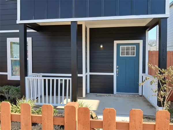 a front view of a house with a porch