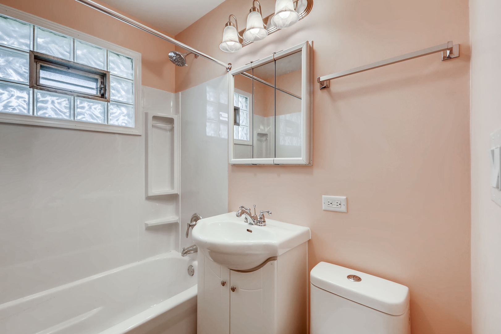 3104 Dove Court Rolling Meadows, IL 60008 - Photo 11 of 12 a bathroom with a sink a mirror toilet and bathtub