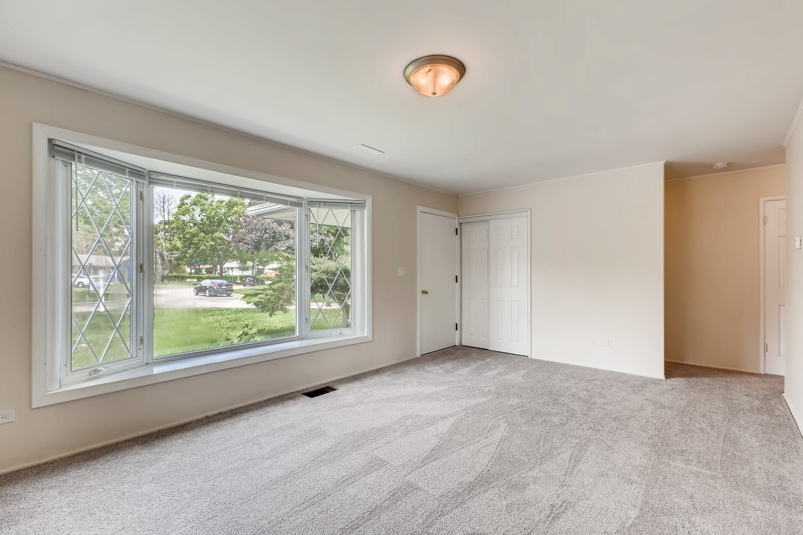 3104 Dove Court Rolling Meadows, IL 60008 - Photo 2 of 12 a view of an empty room with a window