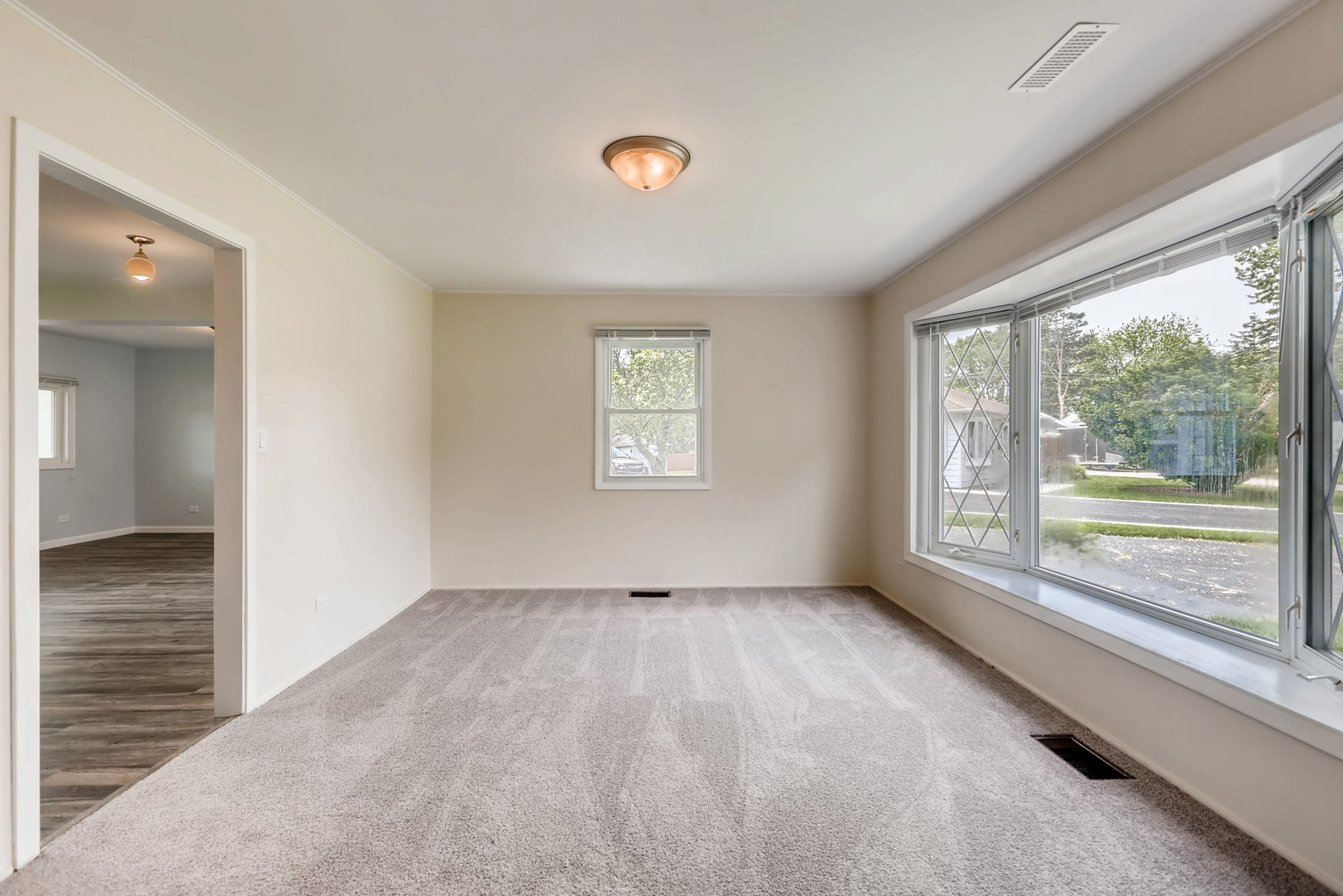 3104 Dove Court Rolling Meadows, IL 60008 - Photo 3 of 12 an empty room with windows