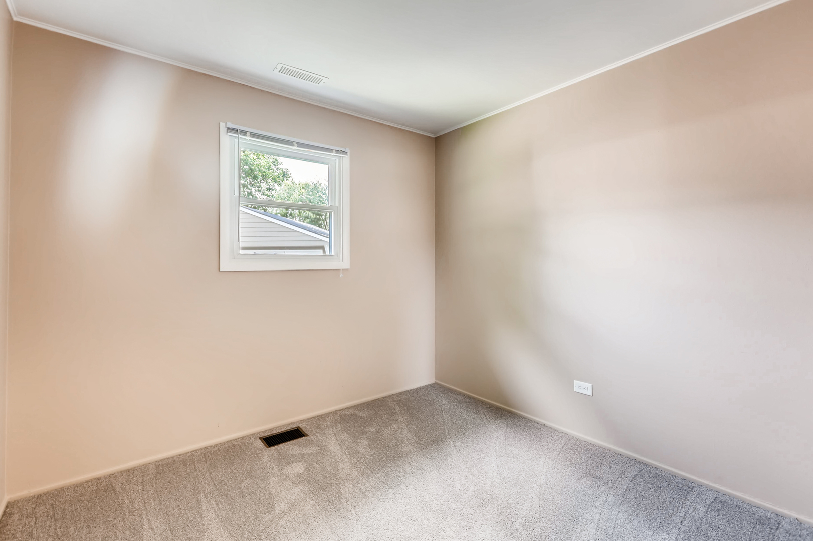3104 Dove Court Rolling Meadows, IL 60008 - Photo 9 of 12 an empty room with a window