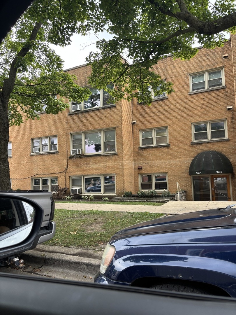 5601 West Byron Street, Unit A Chicago, IL 60634 - Photo 2 of 7 a house view with a outdoor space
