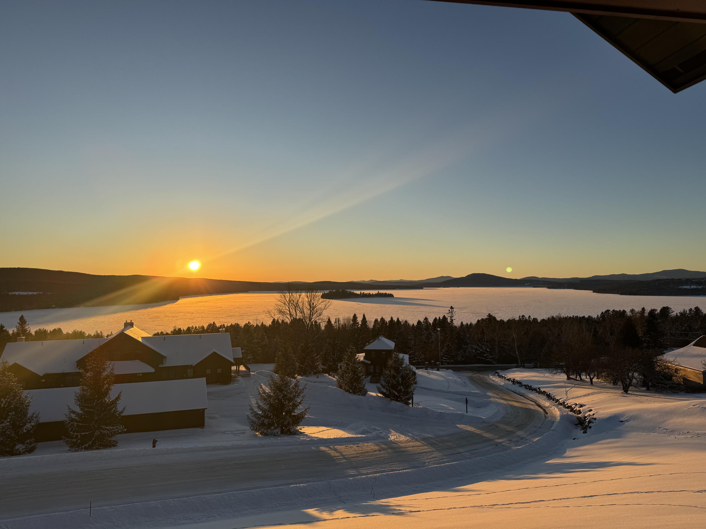 26 Whip Willow Farm Road, Unit 10 Rangeley, ME 04970 - Photo 12 of 35 Winter sunset from deck