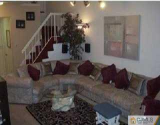 5508 Hana Road Edison, NJ 08817 - Photo 3 of 6 a living room with furniture and a potted plant