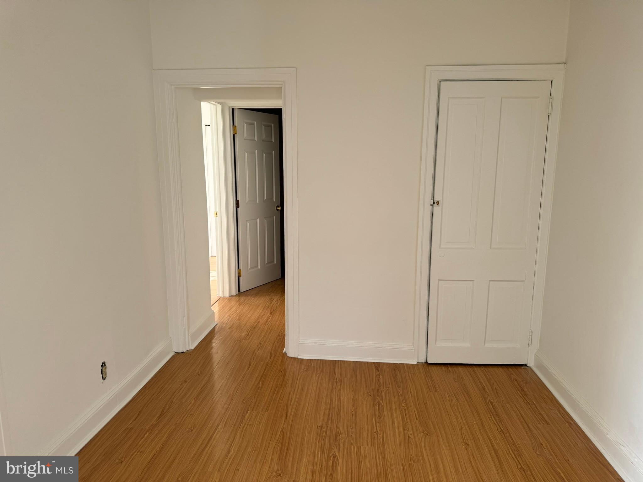 1 North Main Street, Unit 2F Ambler, PA 19002 - Photo 14 of 23 a view of an empty room with wooden floor and closet