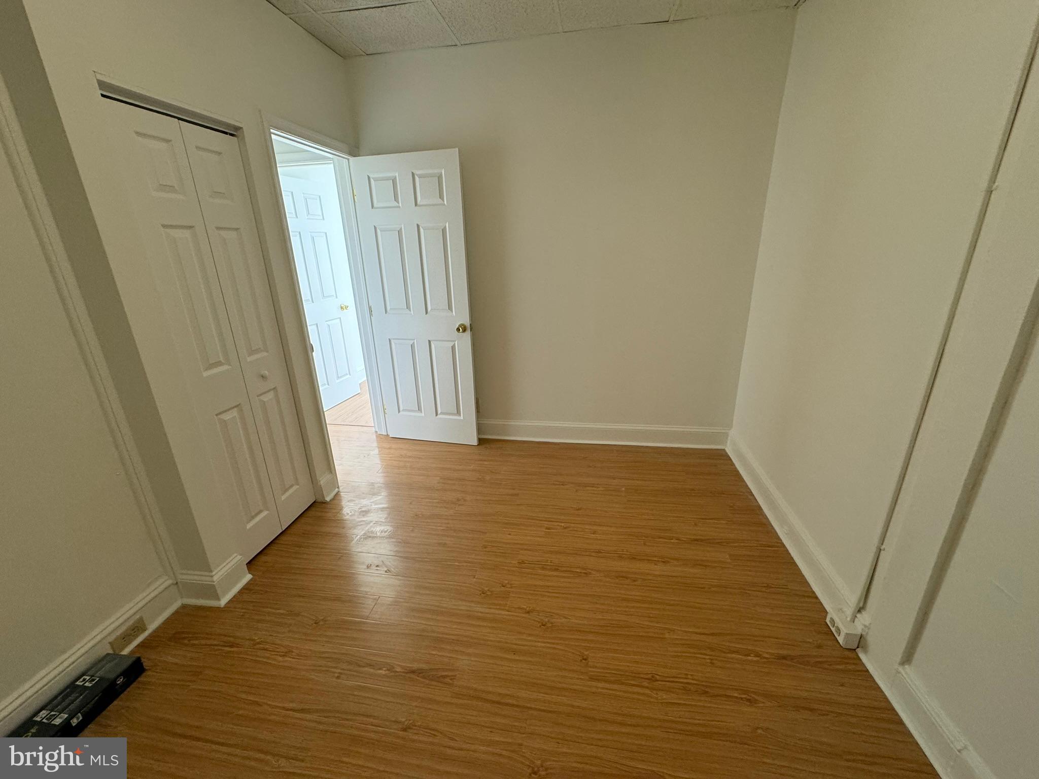1 North Main Street, Unit 2F Ambler, PA 19002 - Photo 17 of 23 a view of a hallway with wooden floor