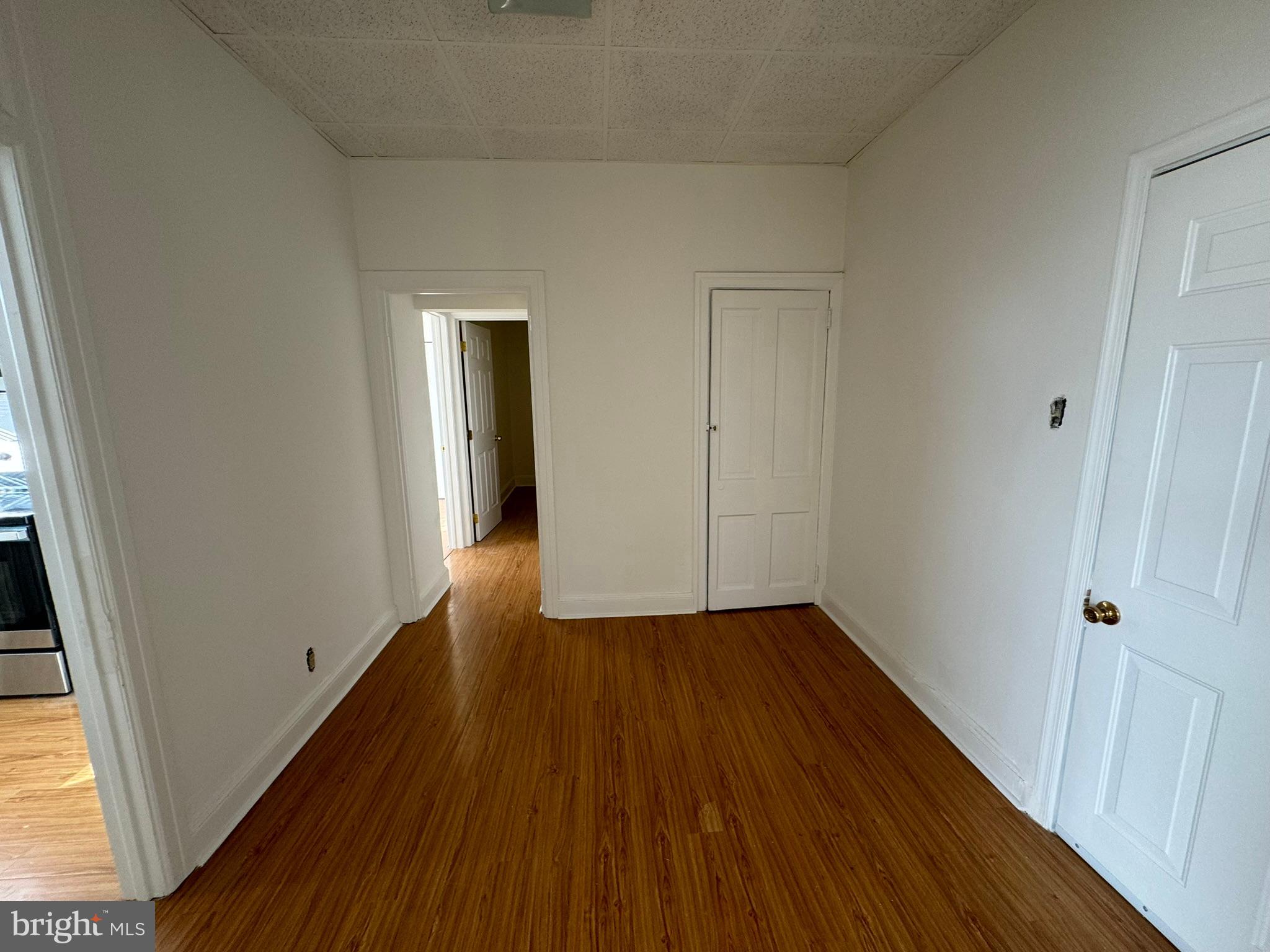 1 North Main Street, Unit 2F Ambler, PA 19002 - Photo 20 of 23 a view of a hallway with wooden floor