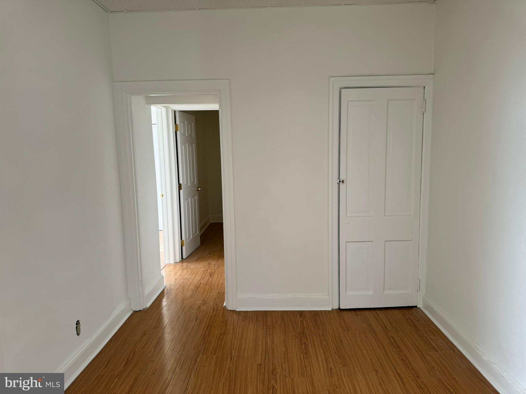 1 North Main Street, Unit 2F Ambler, PA 19002 - Photo 21 of 23 a view of a hallway with wooden floor