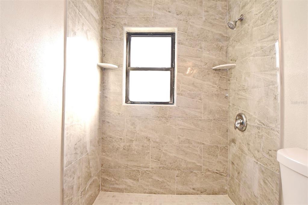 2148 Ridge Drive Winter Park, FL 32792 - Photo 7 of 33 a bathroom with a shower