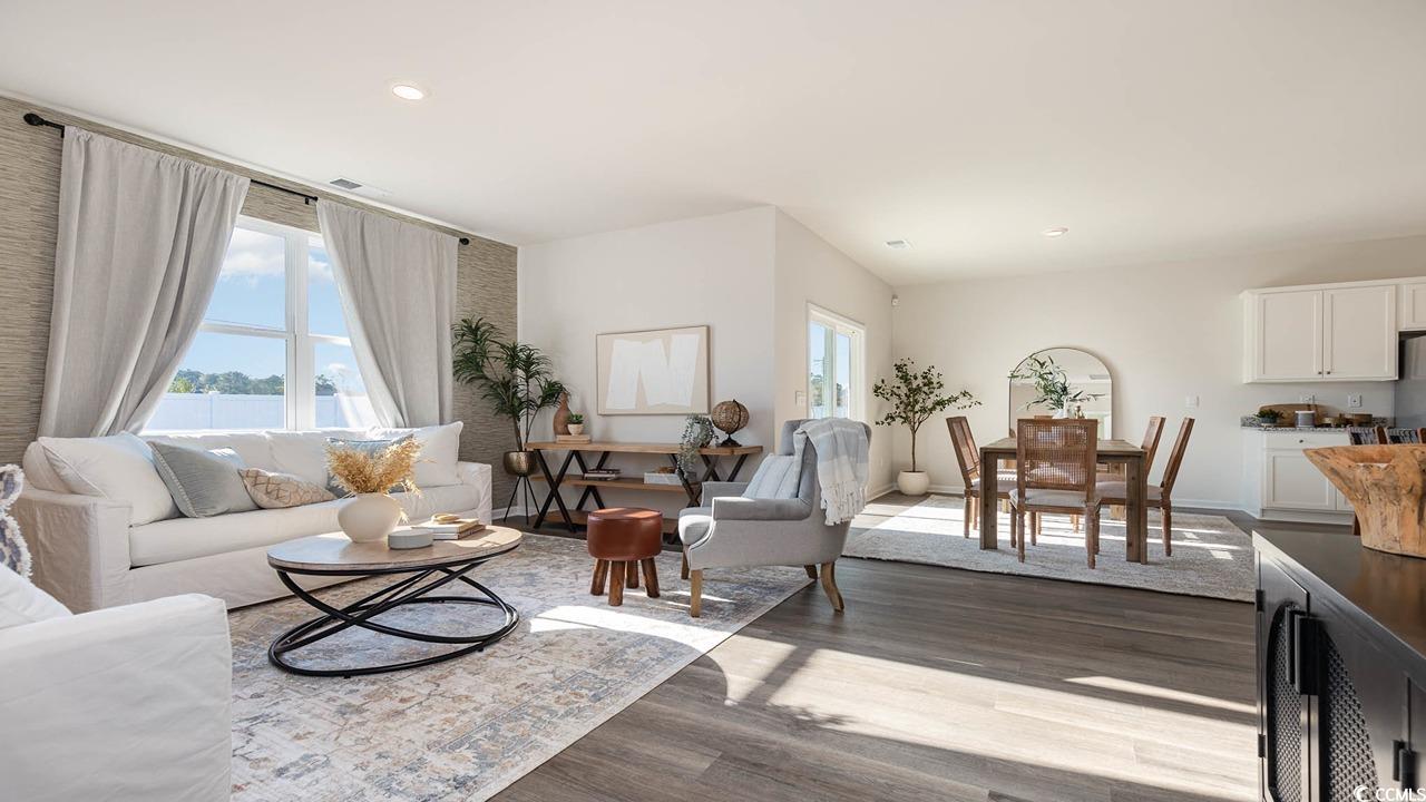 7383 Meadow Walk Loop Loris, SC 29569 - Photo 11 of 29 Living area featuring recessed lighting and dark wood-style flooring