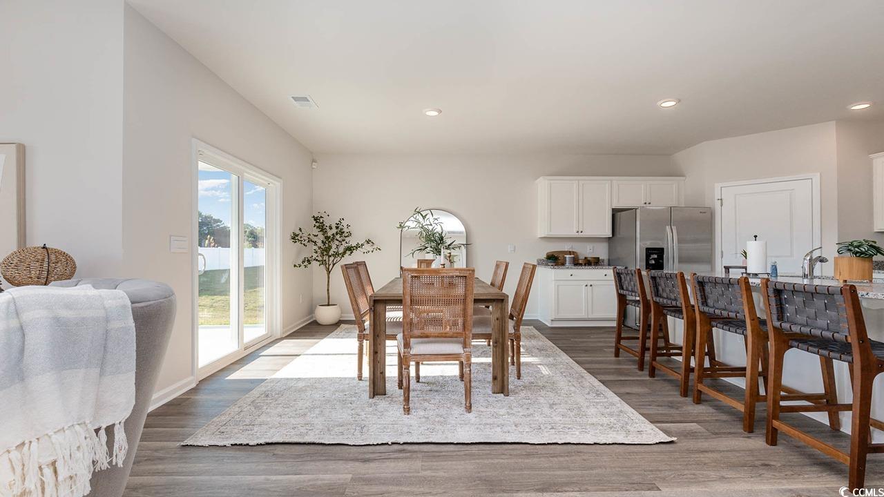 7383 Meadow Walk Loop Loris, SC 29569 - Photo 7 of 29 Dining room featuring recessed lighting and dark wood-style floors