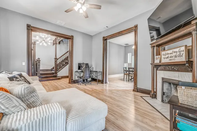 a bed room with a bed and a television