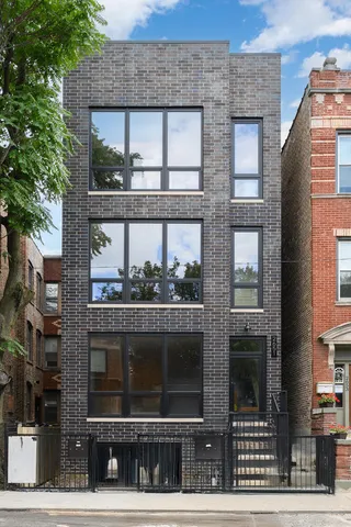 a view of a brick building with a window