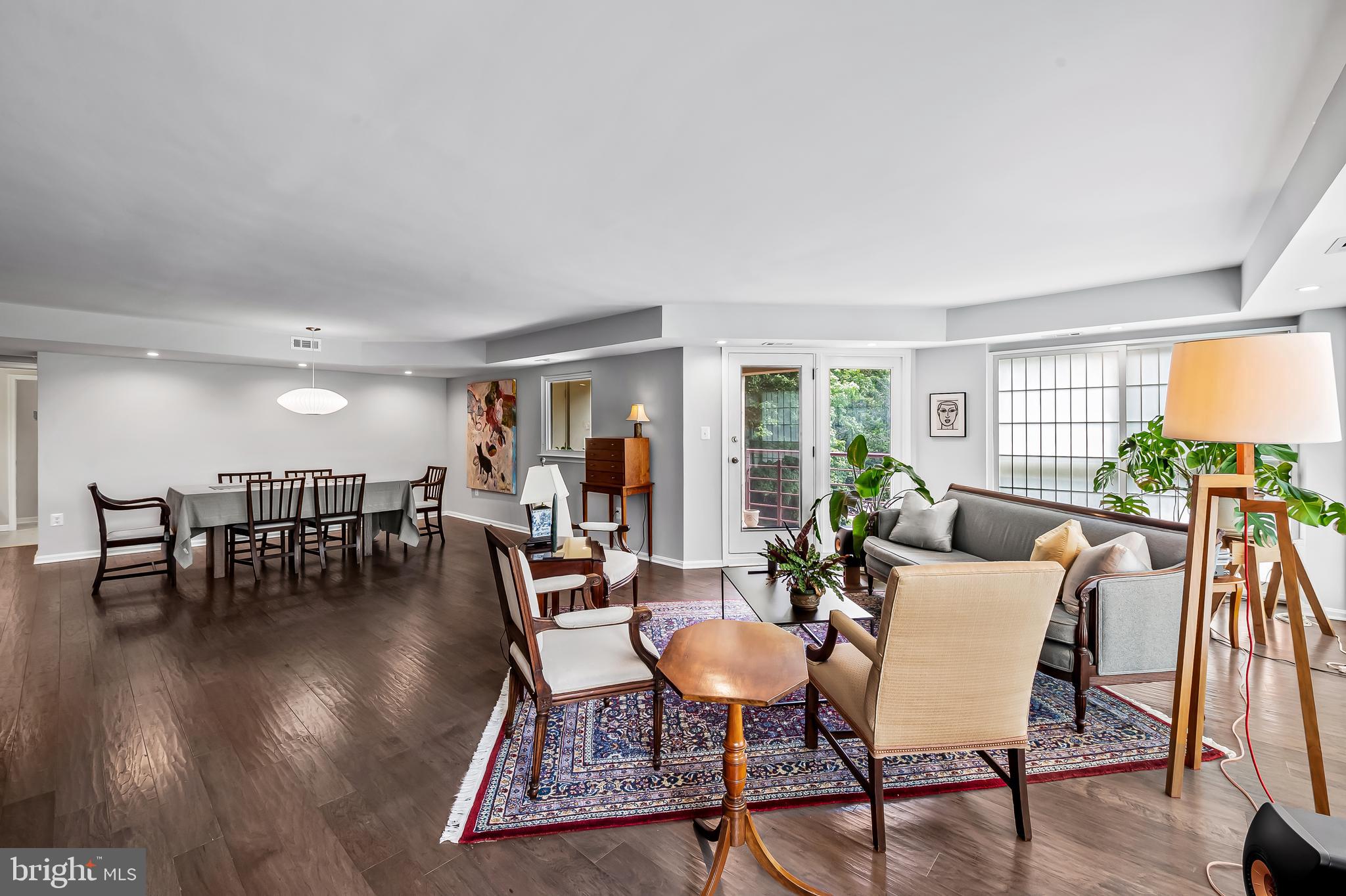 1040 Deer Ridge Drive, Unit 200 Baltimore, MD 21210 - Photo 11 of 38 a dining room with furniture window and wooden floor