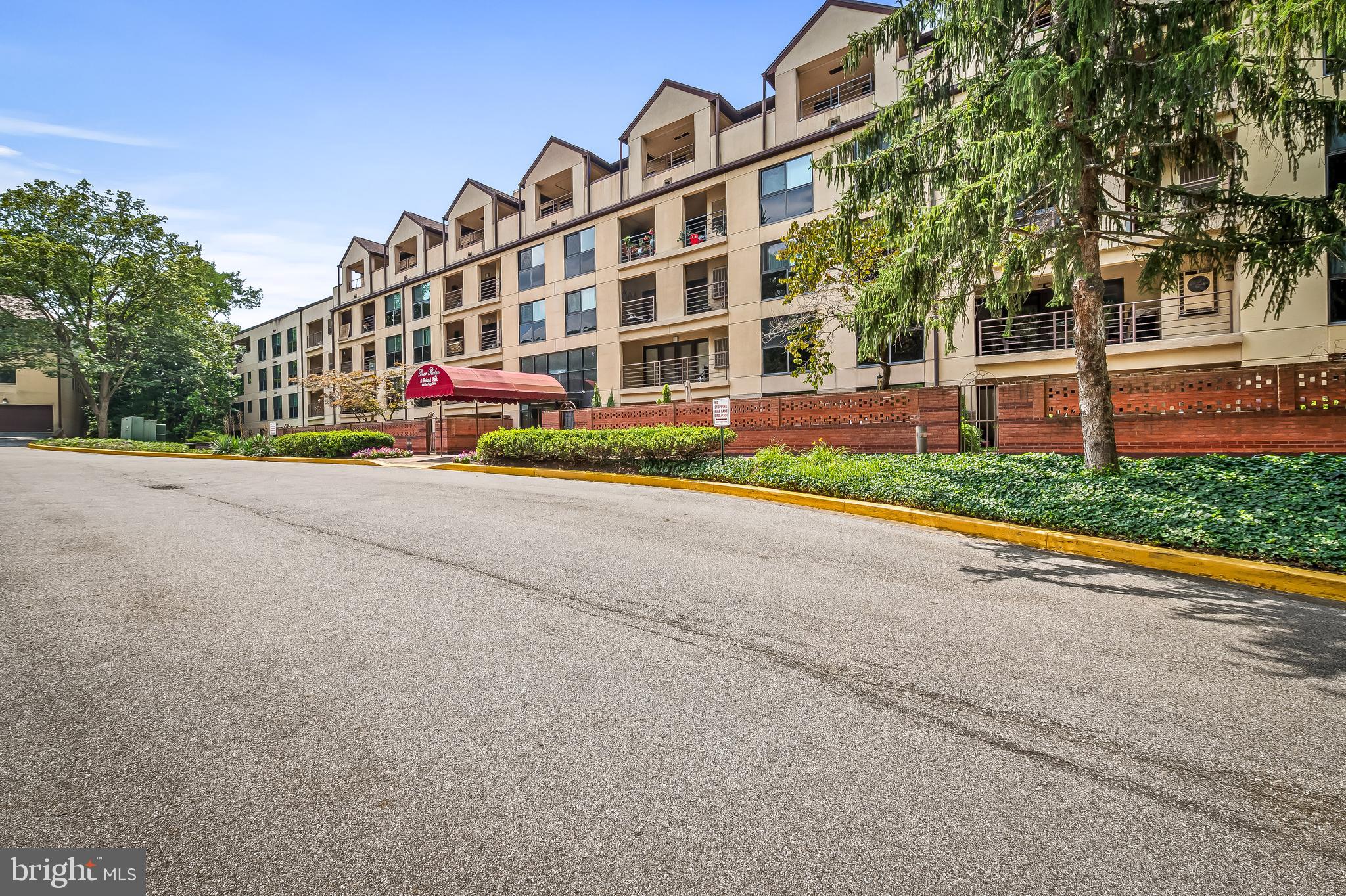1040 Deer Ridge Drive, Unit 200 Baltimore, MD 21210 - Photo 2 of 38 a view of street with large building