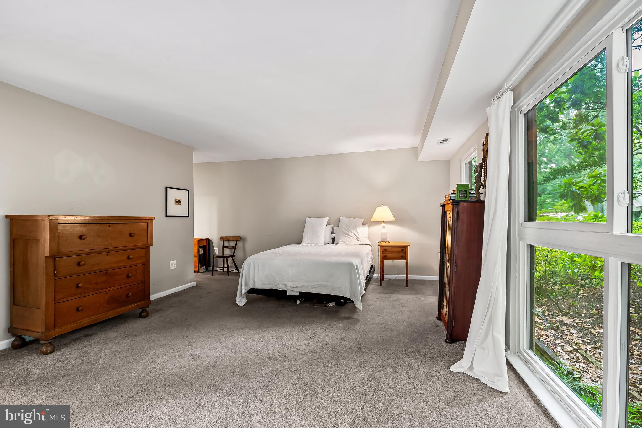 1040 Deer Ridge Drive, Unit 200 Baltimore, MD 21210 - Photo 25 of 38 a bed room with a bed and a window
