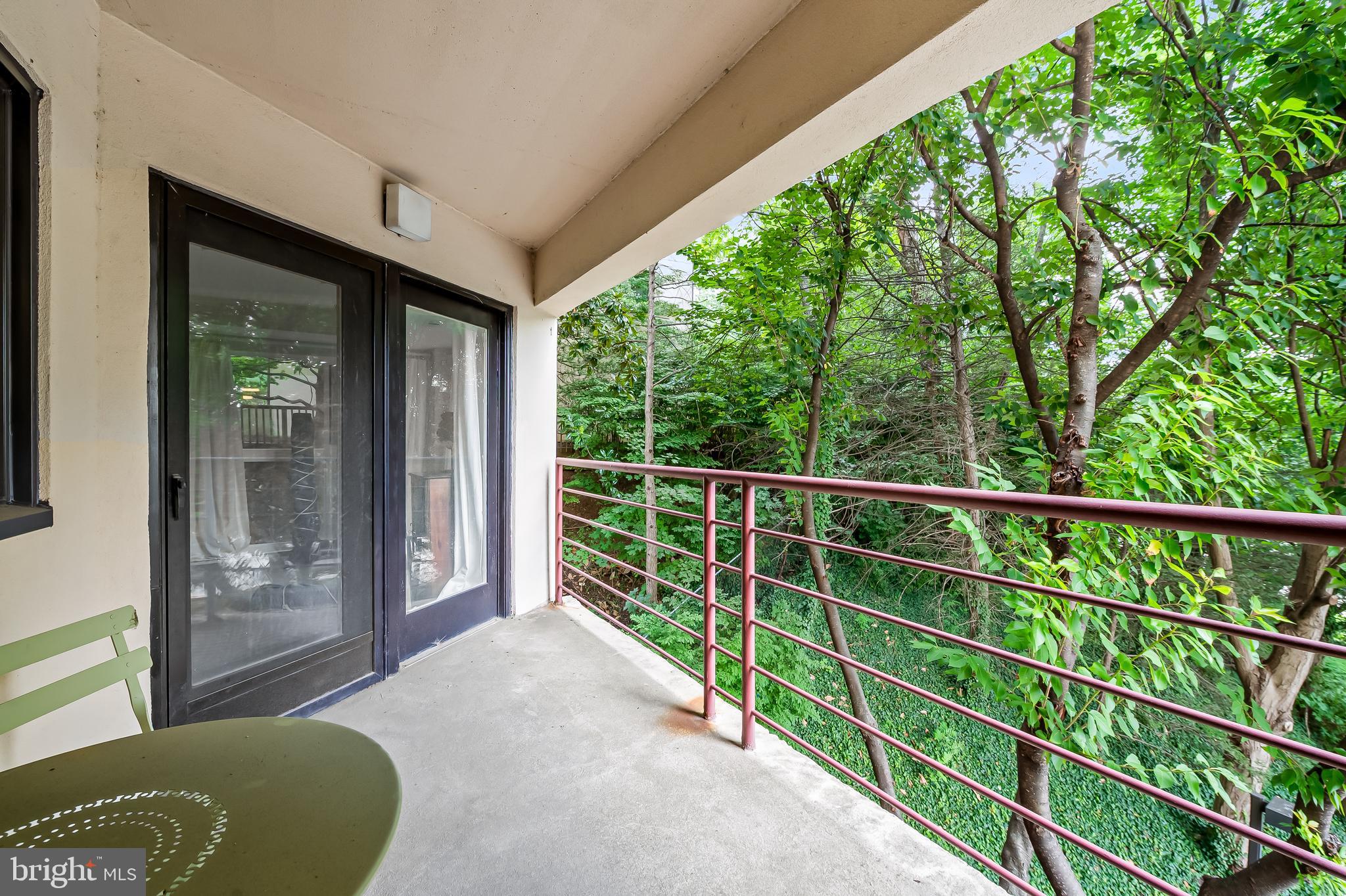 1040 Deer Ridge Drive, Unit 200 Baltimore, MD 21210 - Photo 38 of 38 a porch with a yard in back