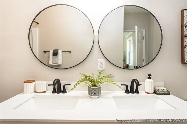 a view of a livingroom with furniture and staircase