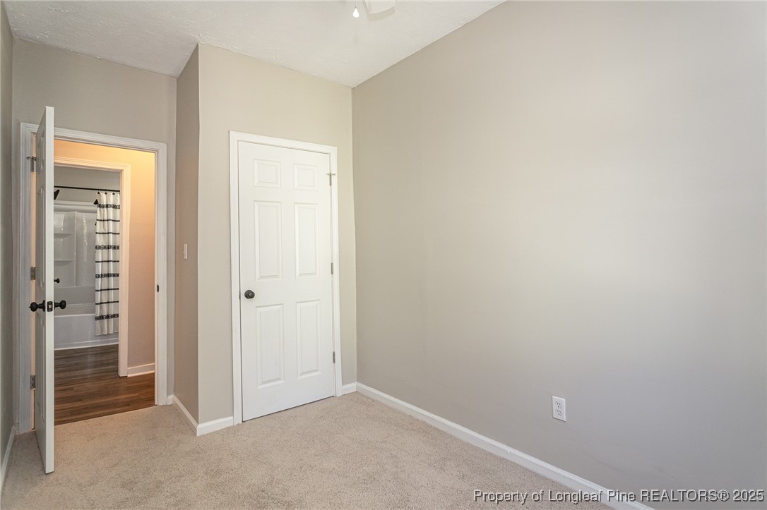 102 North 17th Street Erwin, NC 28339 - Photo 27 of 32 an empty room with closet