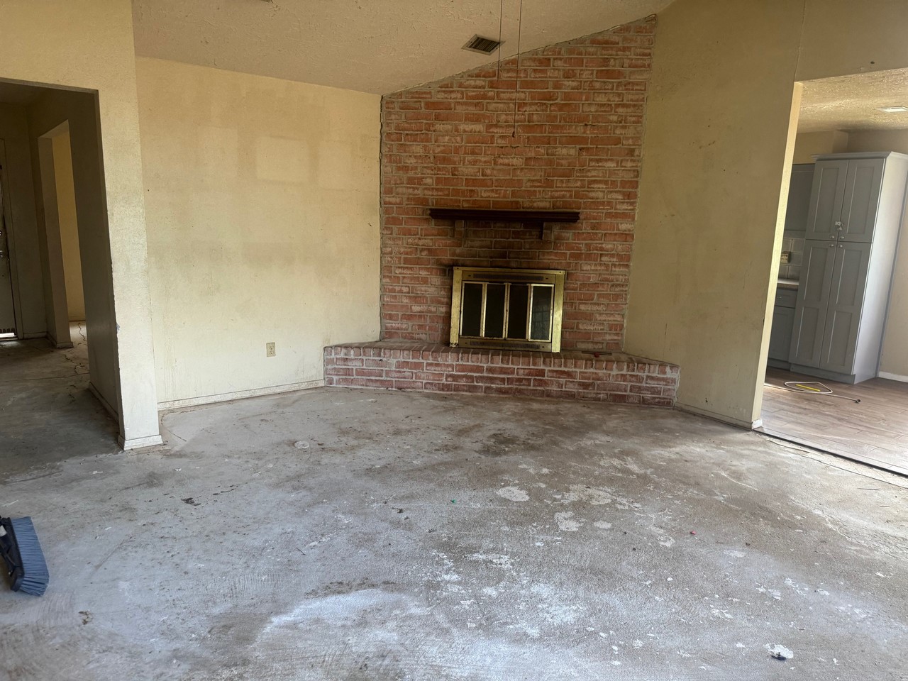 15950 Chimney Rock Road Houston, TX 77489 - Photo 3 of 7 a view of an empty room with a fireplace