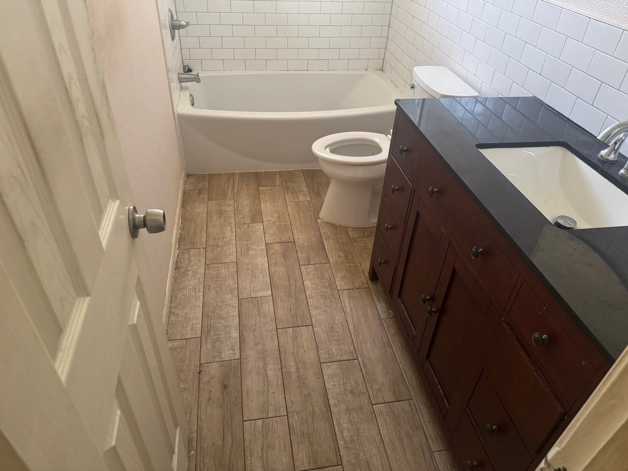 15950 Chimney Rock Road Houston, TX 77489 - Photo 5 of 7 a bathroom with a sink and a mirror