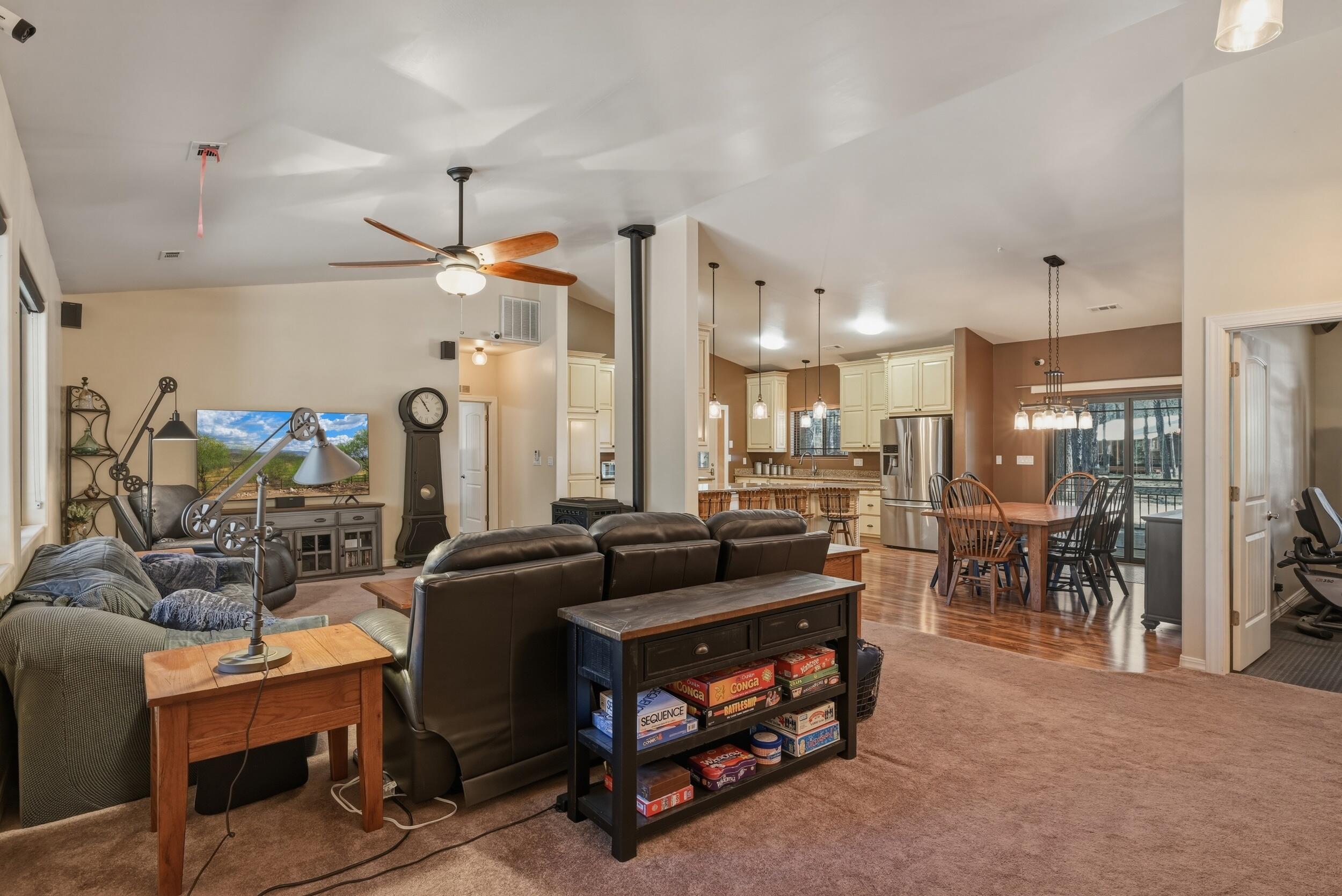 1233 Merzville Road Forest Lakes, AZ 85931 - Photo 5 of 39 a living room with furniture and a table