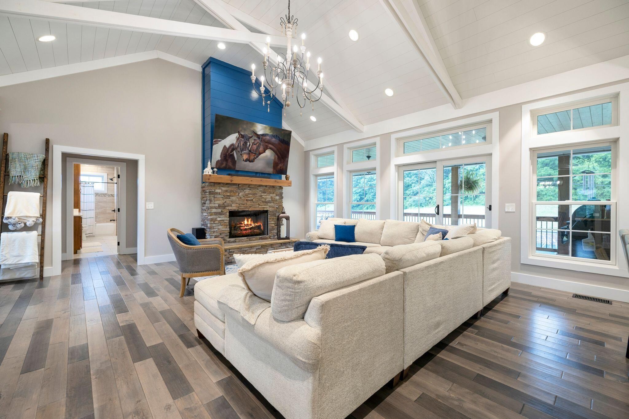 6866 Daus Mountain Road Whitwell, TN 37397 - Photo 8 of 49 a living room with furniture fireplace and a large window