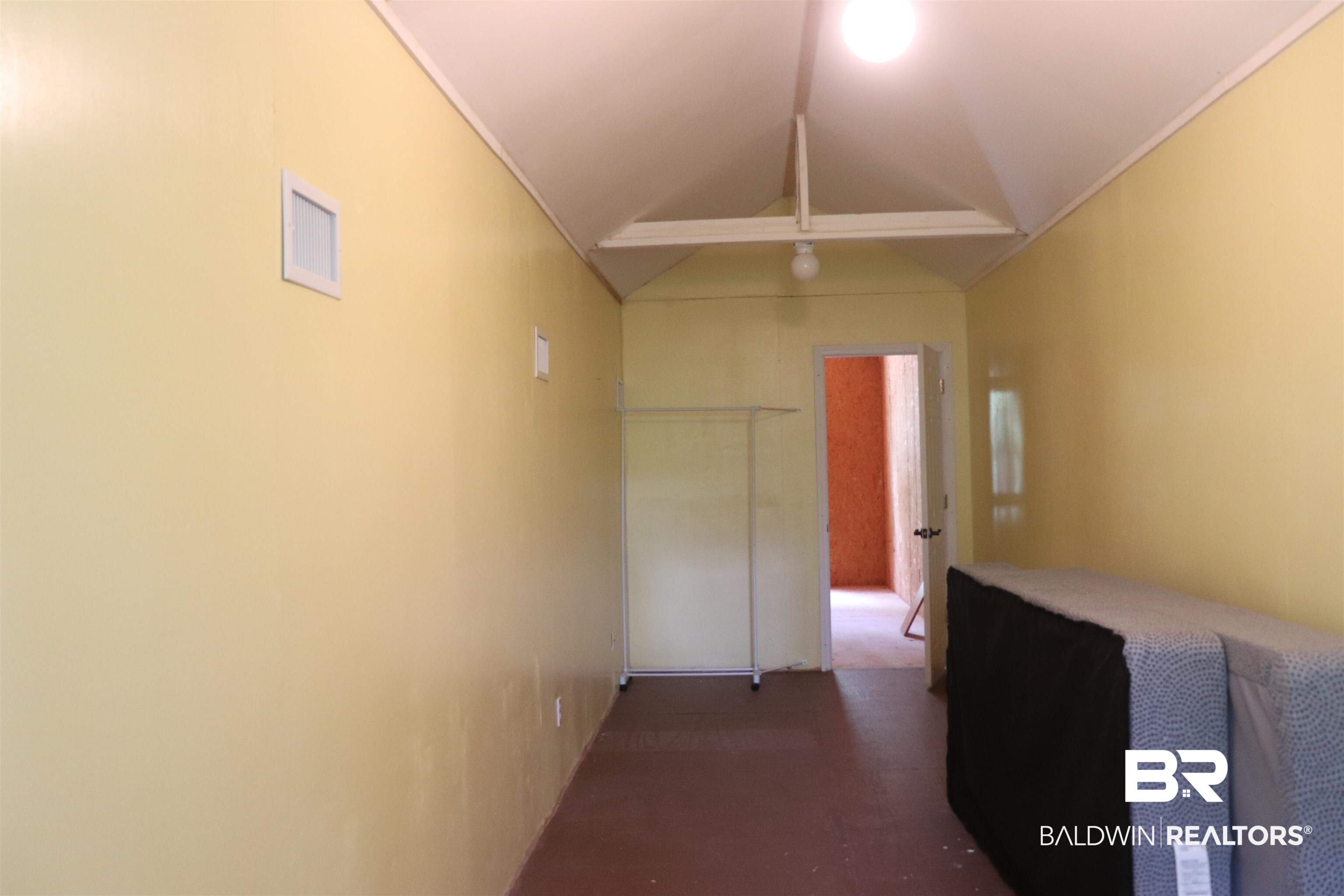102 Brown Road Evergreen, AL 36401 - Photo 19 of 26 Hallway with lofted ceiling