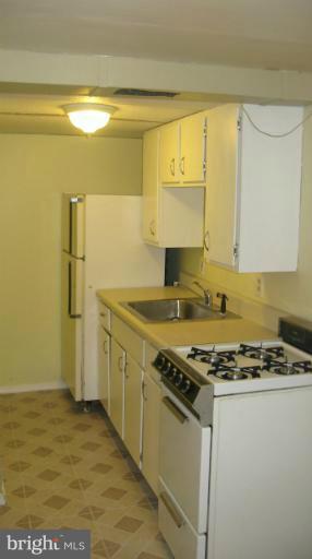 1644 Poles Road Essex, MD 21221 - Photo 15 of 16 lower level kitchen