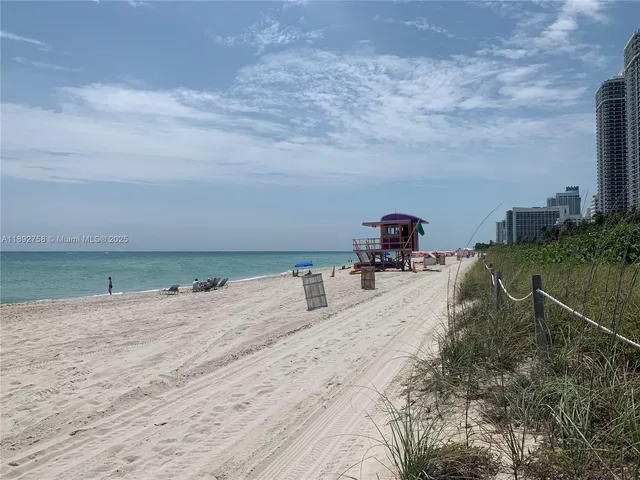 a ocean view with beach