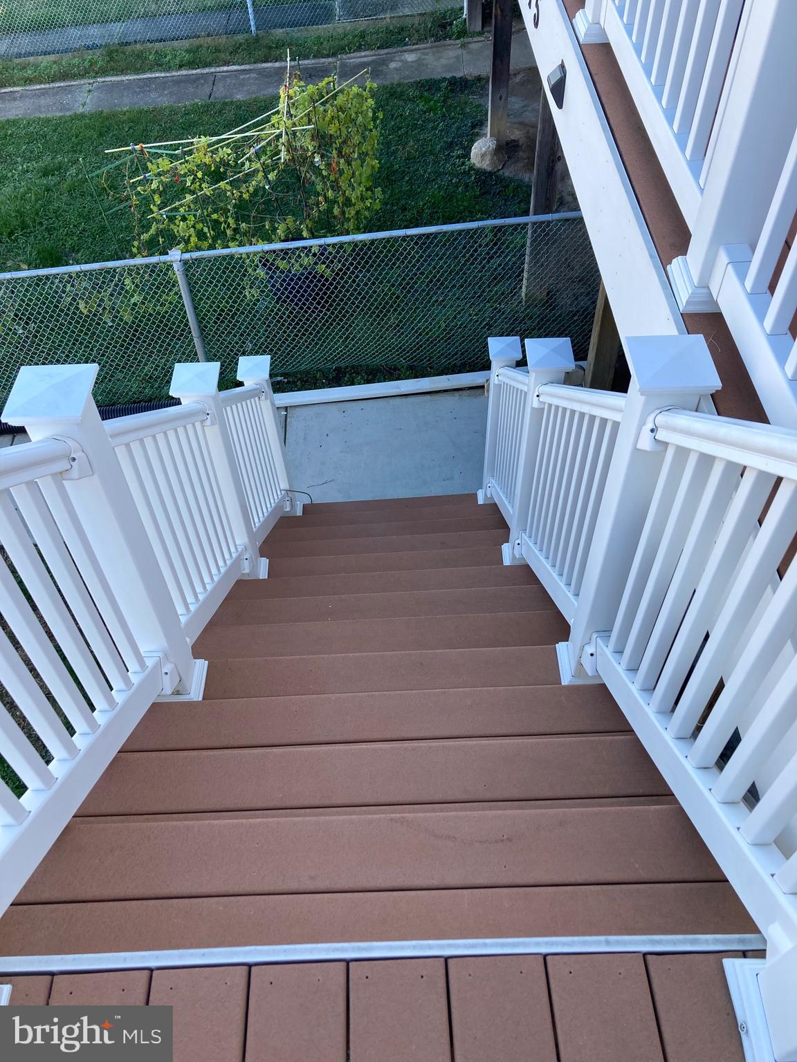 1015 Stormont Circle Halethorpe, MD 21227 - Photo 42 of 43 Walk down deck stairs to yard