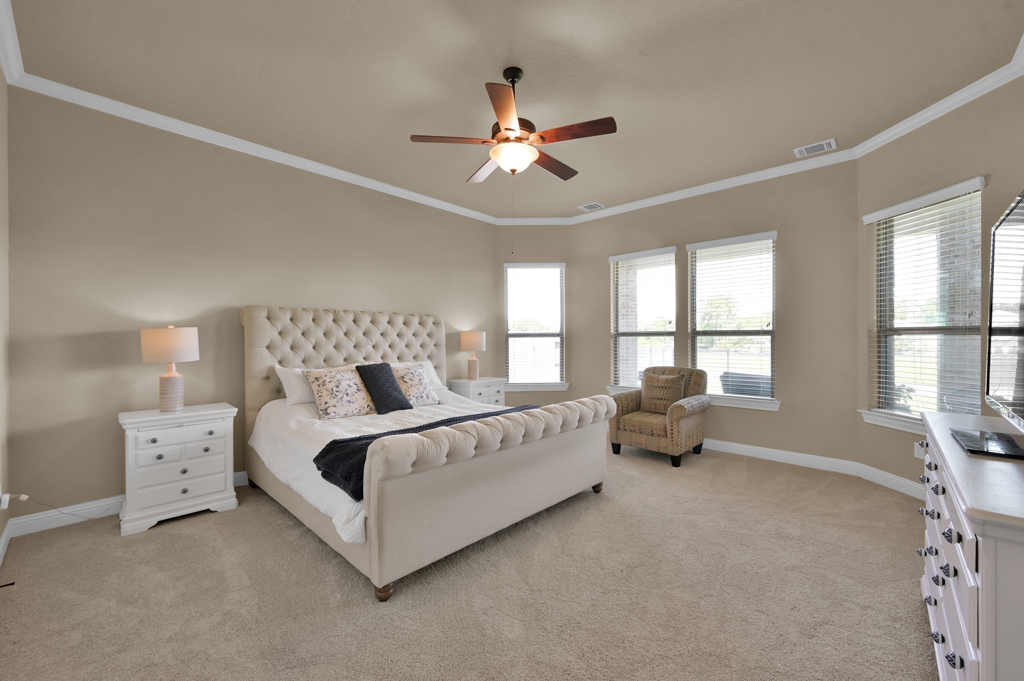 4906 Tres Lagos Drive Spring, TX 77389 - Photo 15 of 32 a spacious bedroom with a bed and a window