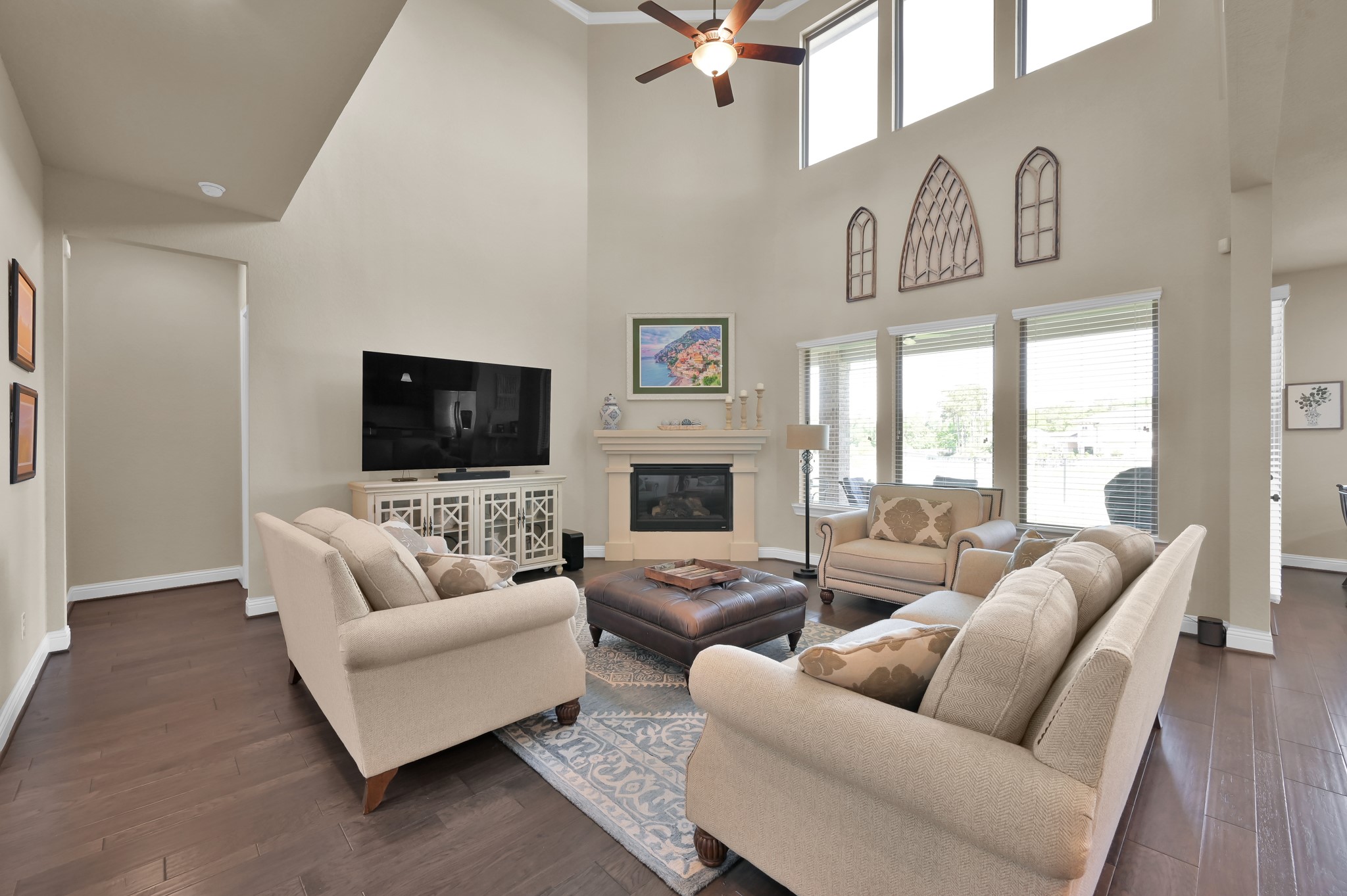 4906 Tres Lagos Drive Spring, TX 77389 - Photo 9 of 32 a living room with furniture and a flat screen tv