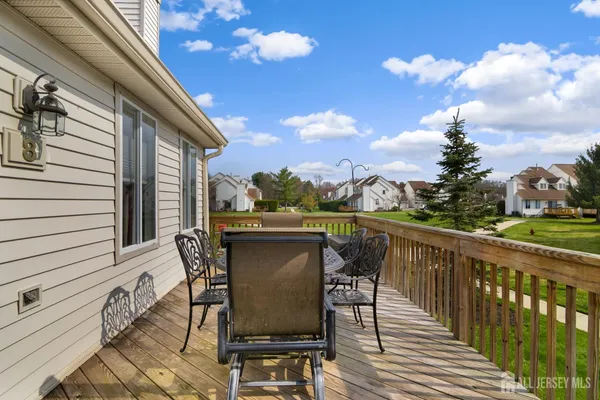 a view of a chairs on the roof deck