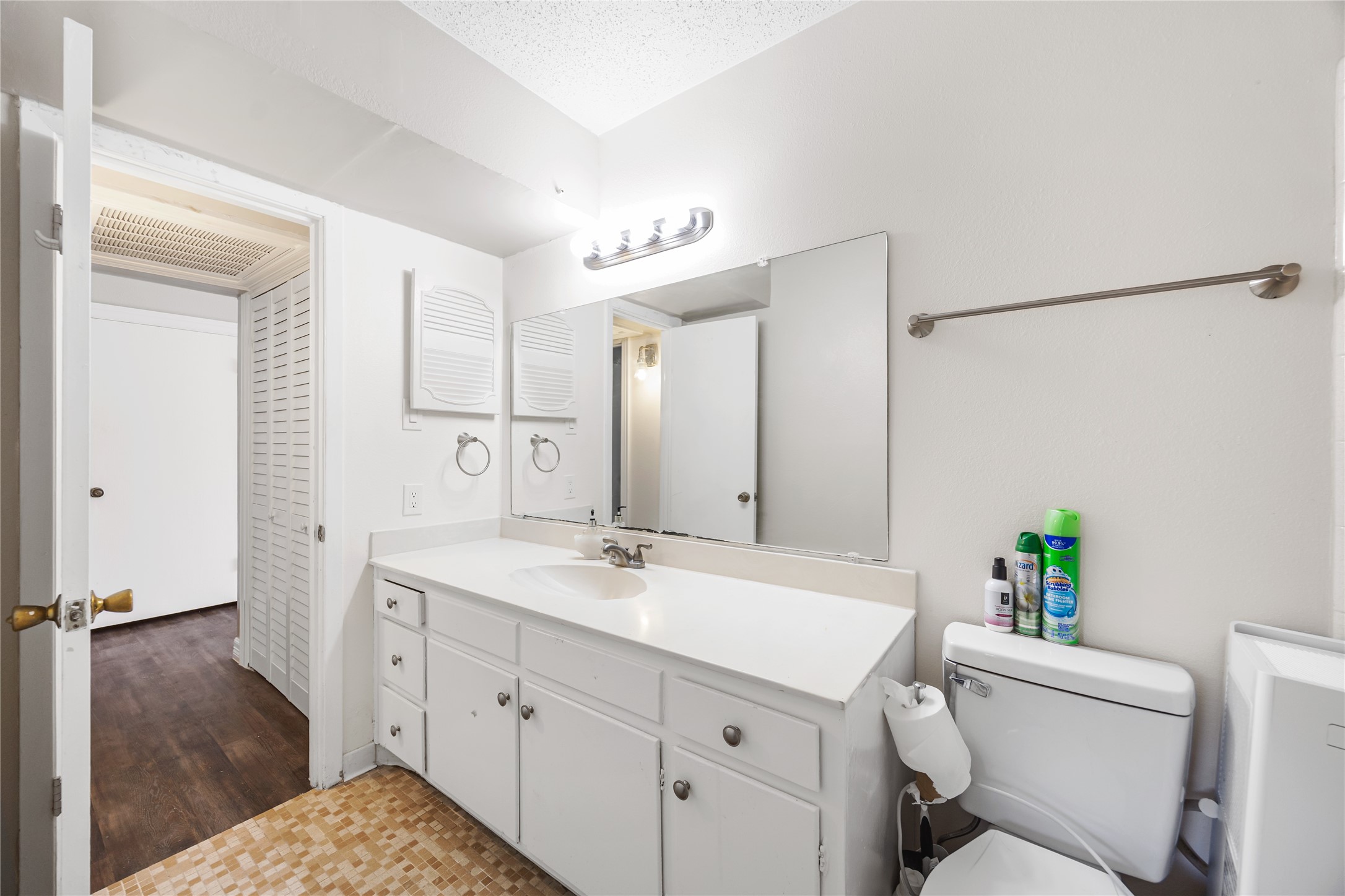 8233 Kingsbrook Road, Unit 233 Houston, TX 77024 - Photo 21 of 24 a spacious bathroom with a granite countertop sink mirror and a shower