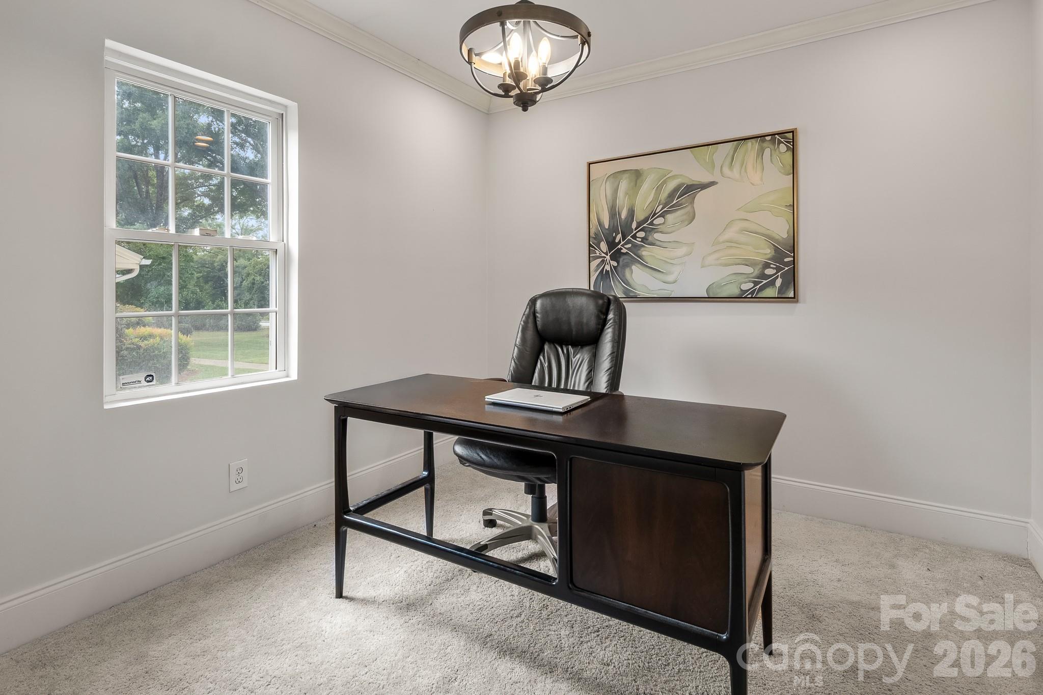 1121 South Wendover Road Charlotte, NC 28211 - Photo 37 of 48 a view of a workspace with furniture