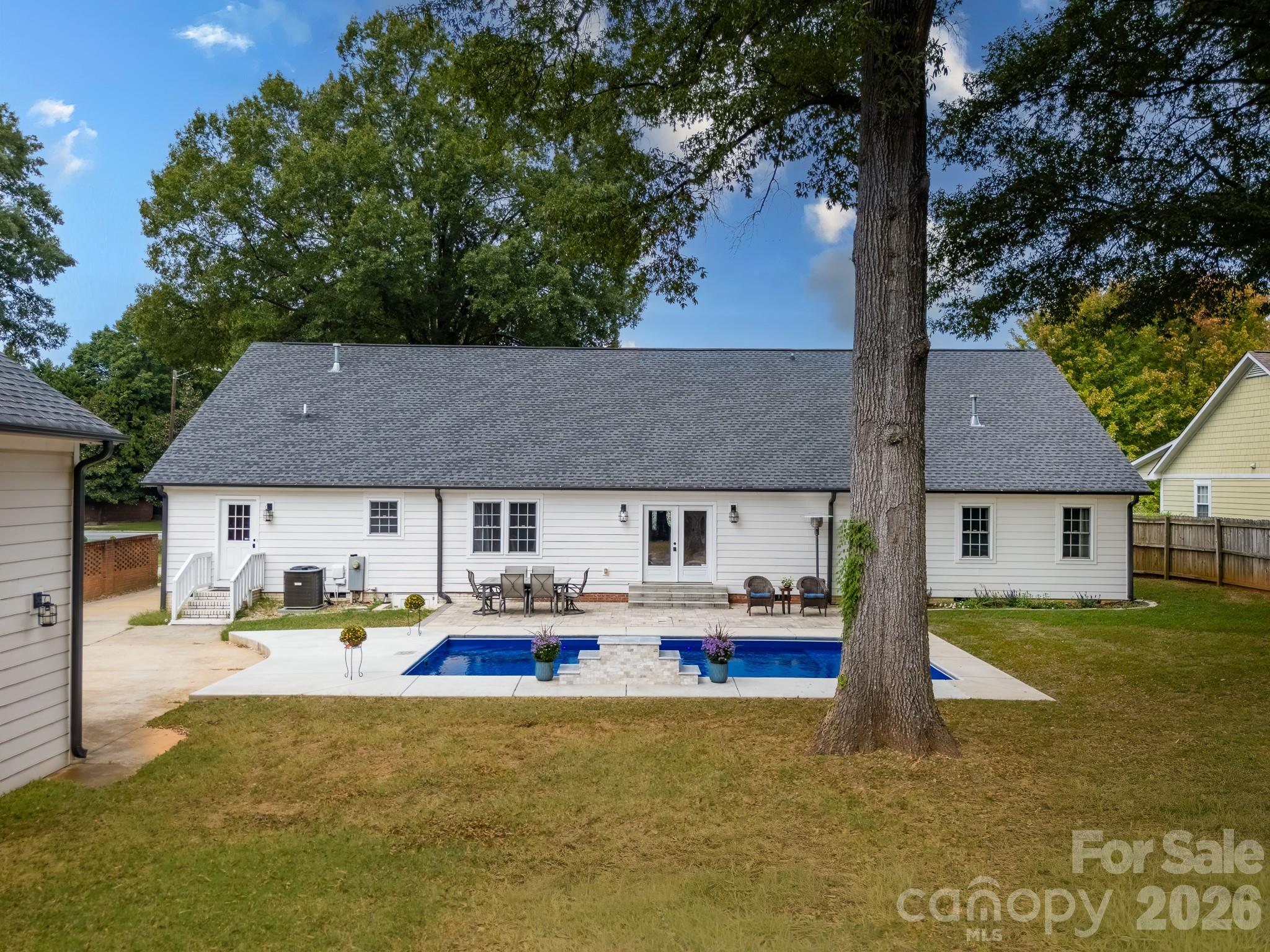 1121 South Wendover Road Charlotte, NC 28211 - Photo 46 of 48 a front view of house with yard and trees in the background
