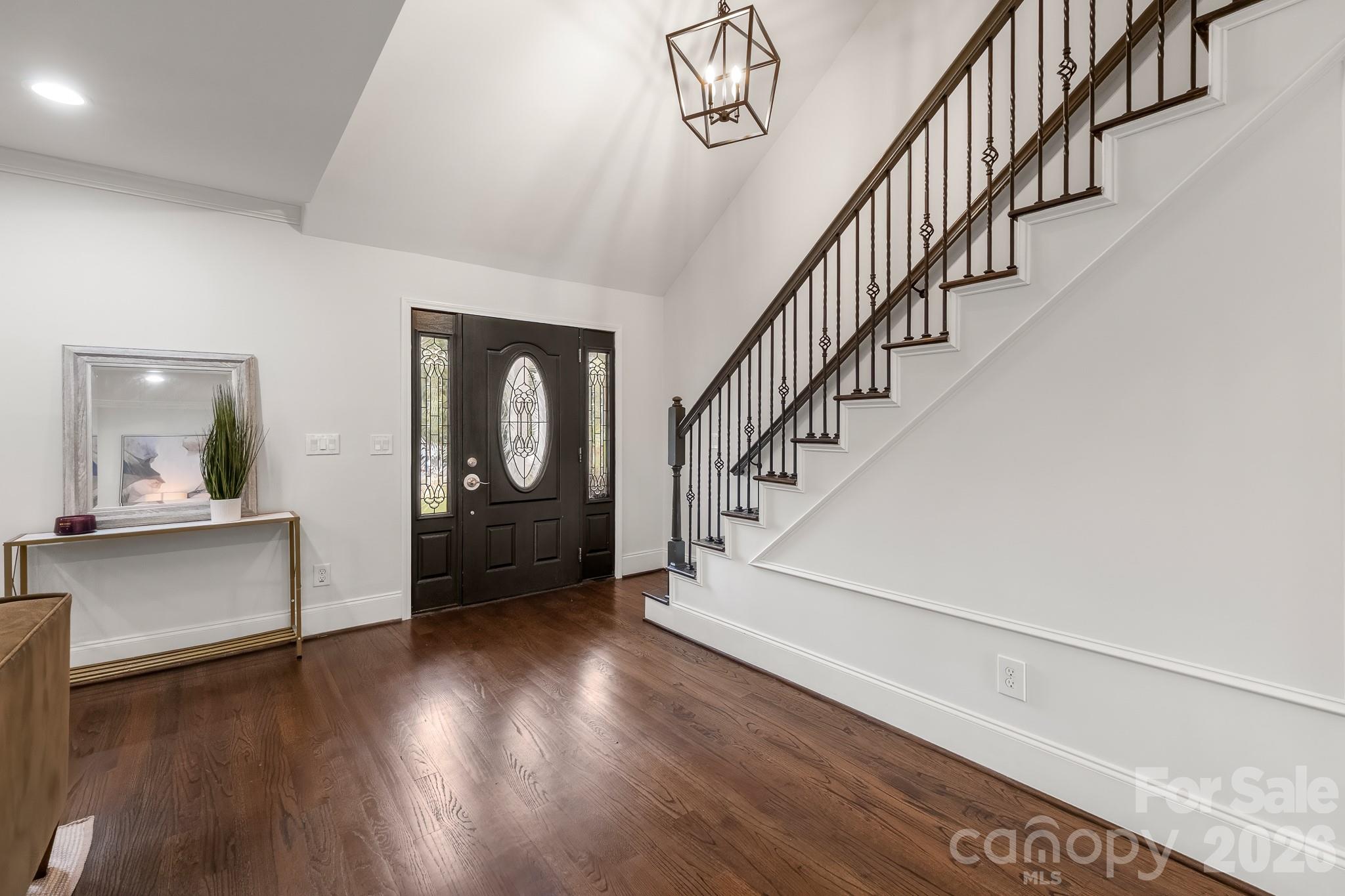1121 South Wendover Road Charlotte, NC 28211 - Photo 6 of 48 a view of entryway and hall with wooden floor
