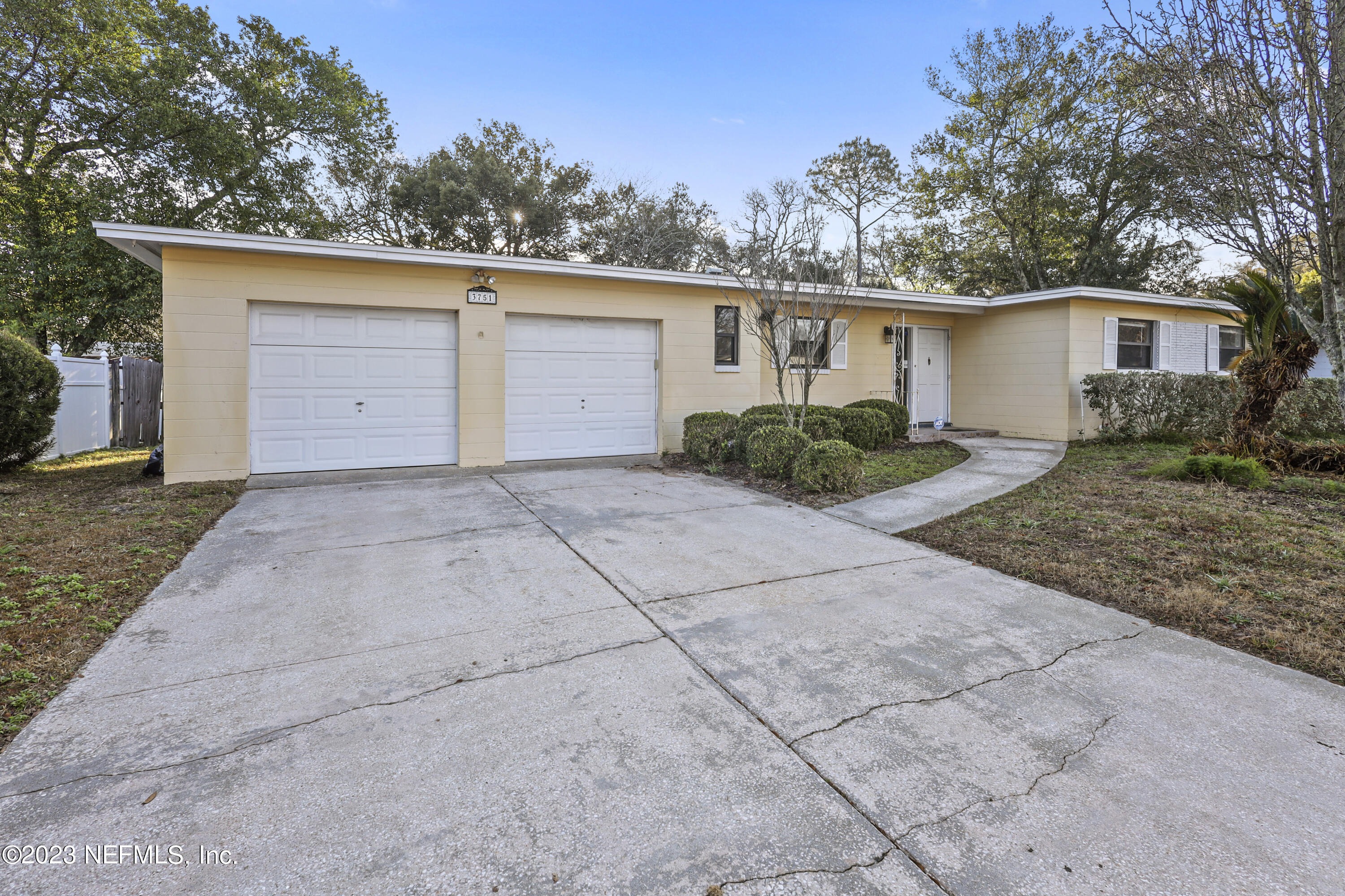 3751 Bess Road Jacksonville, FL 32277 - Photo 5 of 38 front view of a house with a yard