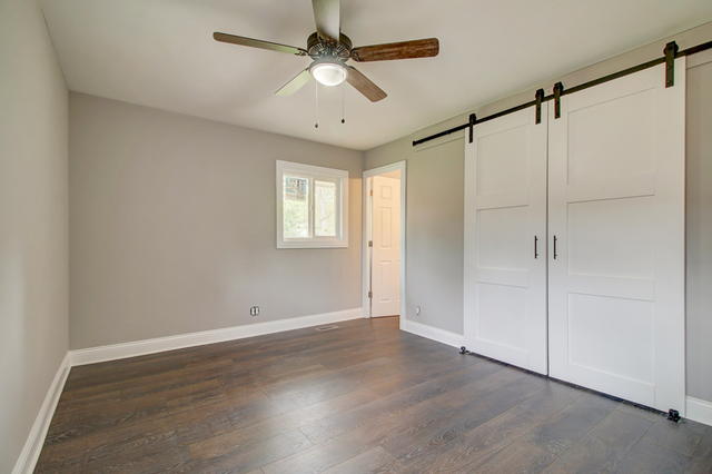 309 Audubon Road Streamwood, IL 60107 - Photo 16 of 25 a view of an empty room with a window