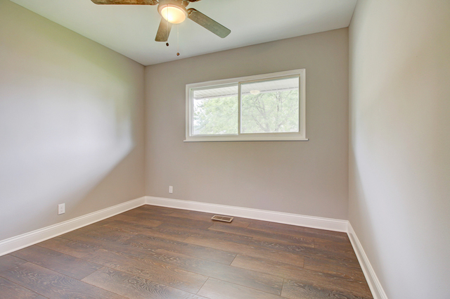 309 Audubon Road Streamwood, IL 60107 - Photo 21 of 25 an empty room with a window